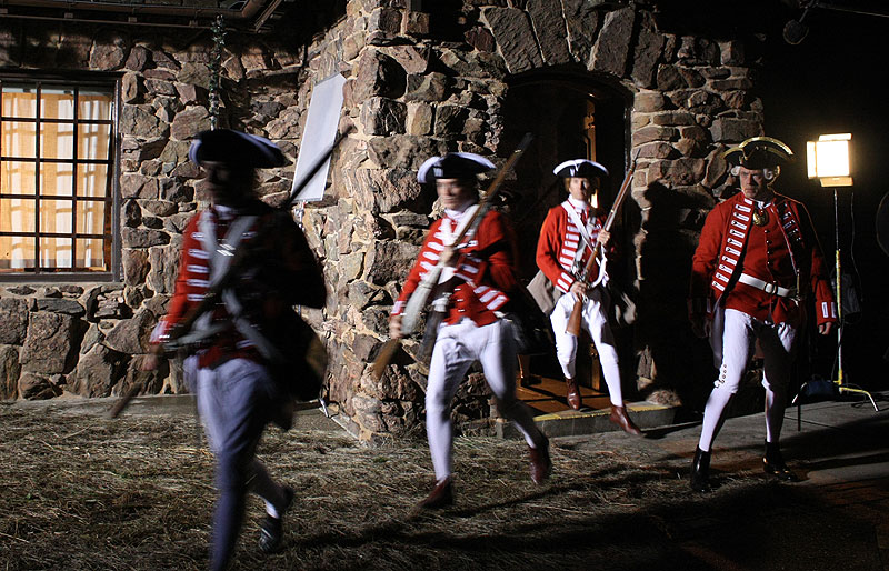 Soldiers run out after the highwayman