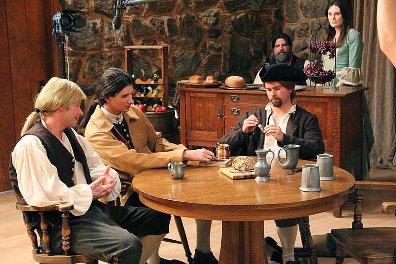George Lindsey (Ben Kroger), Will Stiles (Macleish Day) and Gregory (Nathan Cook) in the tavern with Jake the Innkeeper (Tom Doyle) and his daughter Bess (Marianne Page)
looking on