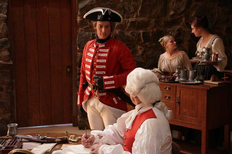 Sgt. Tanner (Justin McQueede) and Lt. Cardwell (Trygve Lode) in the Inn